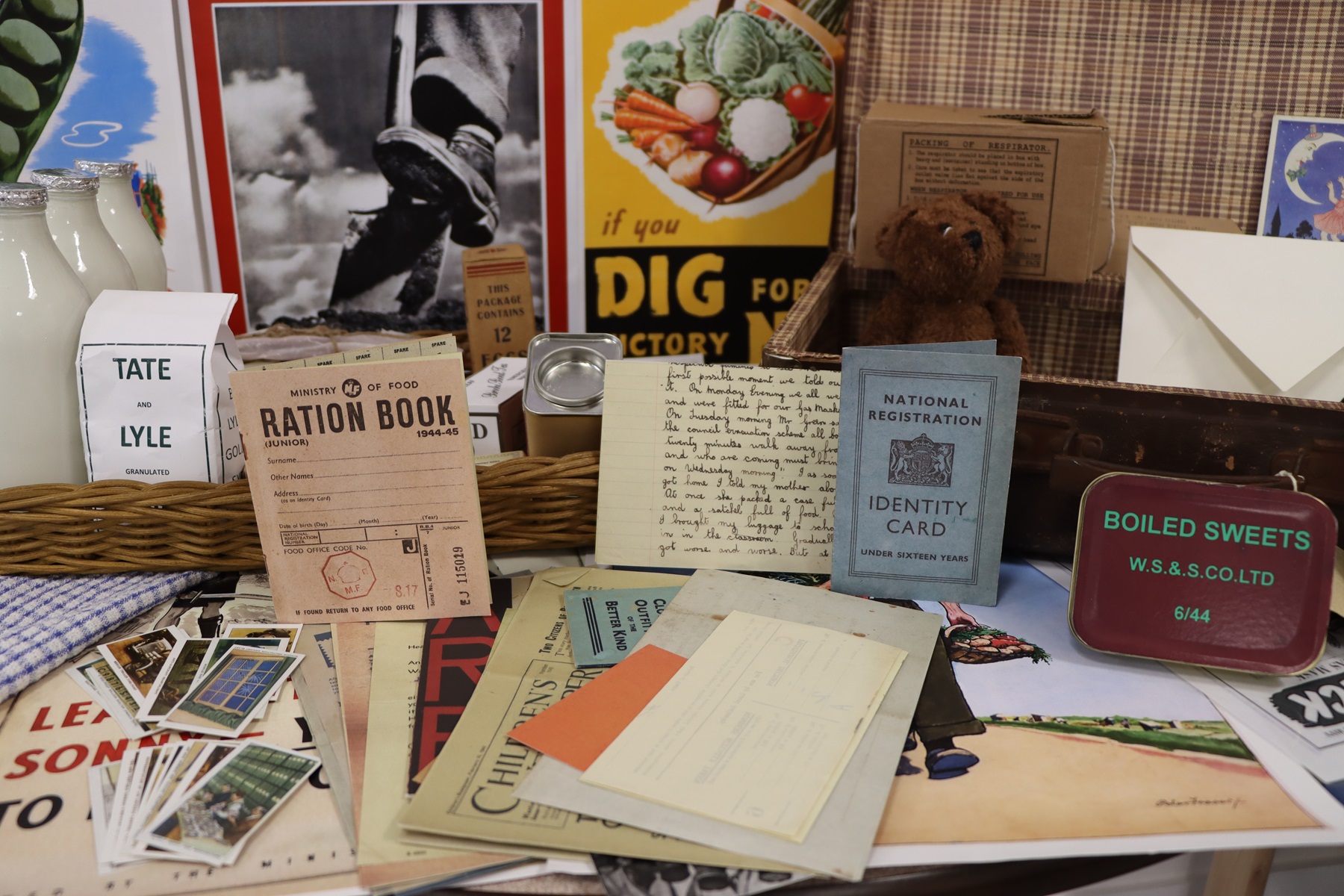 A selection of Second World War memorabilla is displayed on a table