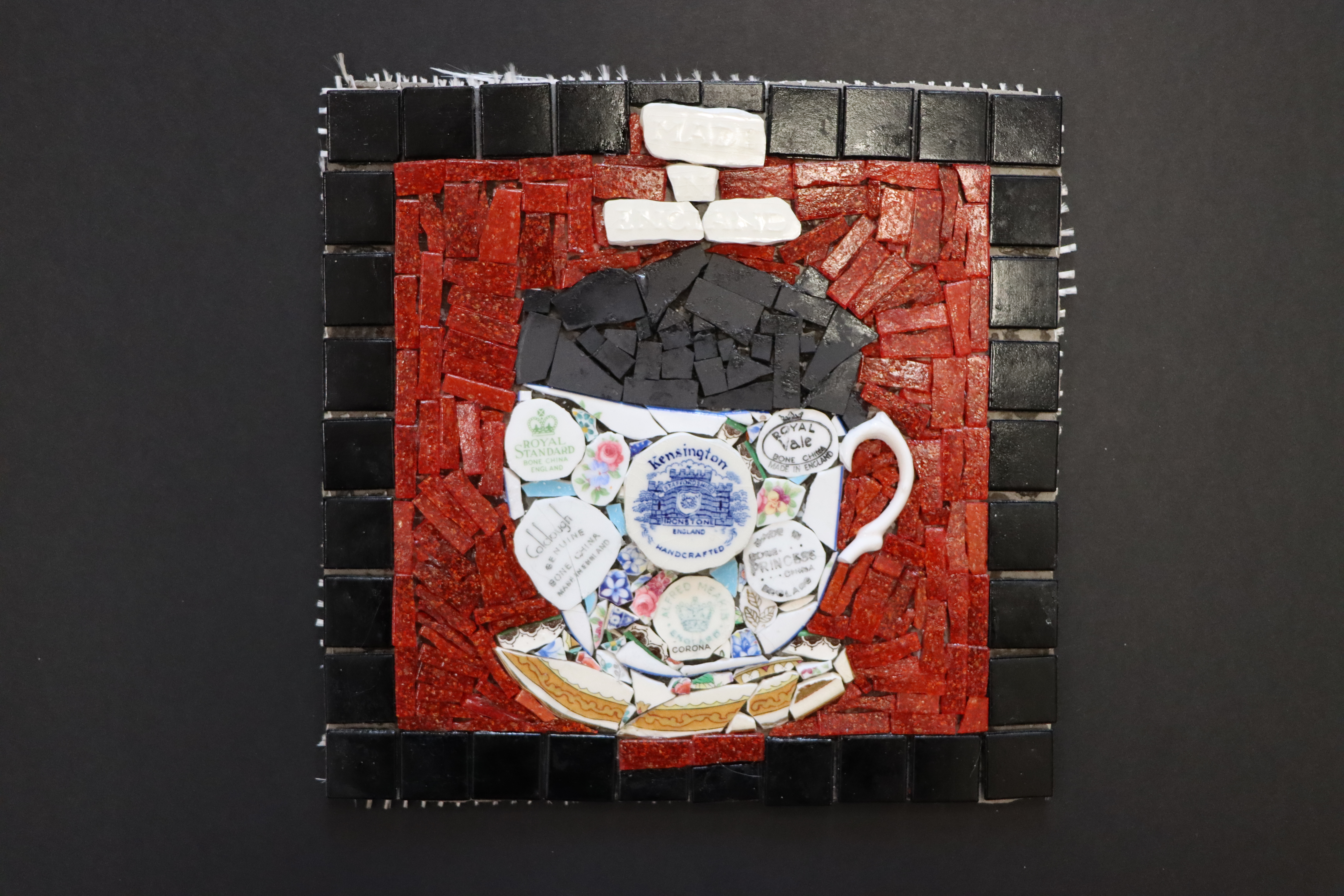 Mosaic of a tea cup, part of Threads of Remembrance