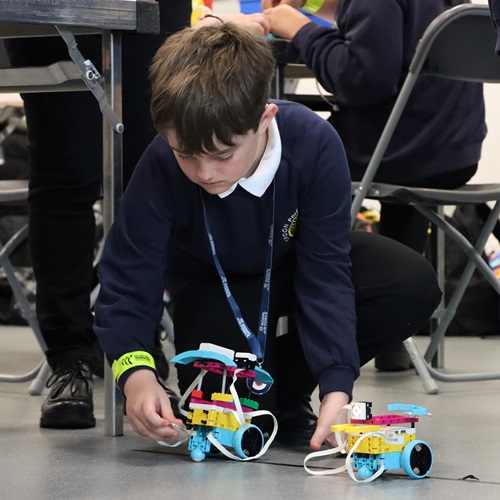 Boy racing robots built at the RAF STEM Takeover in May 2023